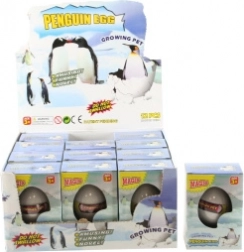 Œuf avec pingouin qui grandit dans l’eau