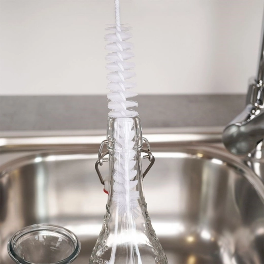 Long reach for narrow containers