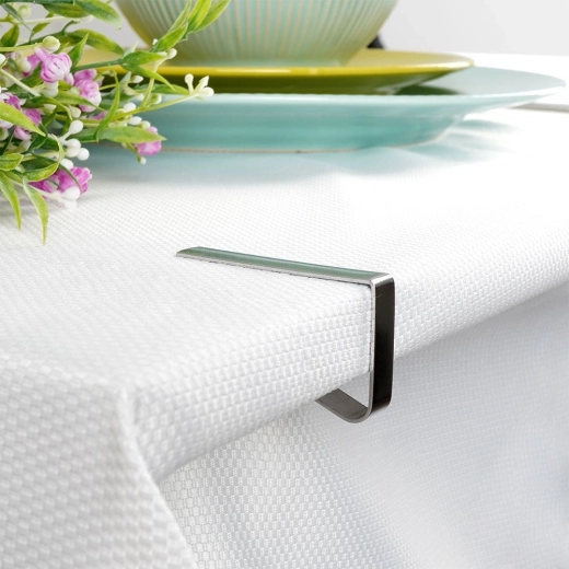 Maintien ferme de la nappe même par vent