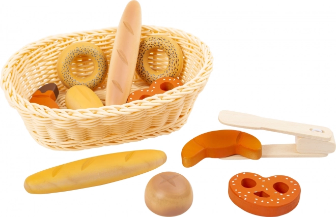 Small Foot wooden set of fresh pastries in a basket