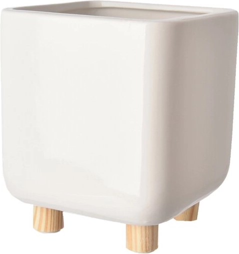 Cache-pot en céramique blanc sur pieds en bois