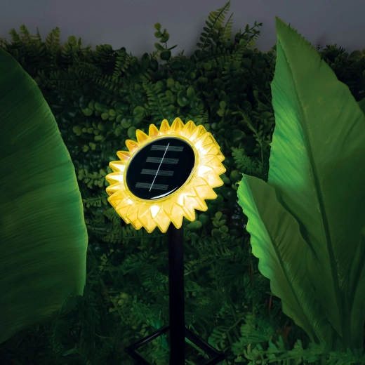 Warmwit licht in de vorm van een zonnebloem