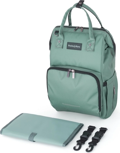 Freie Hände dank Kinderwagenbefestigung und Koffergurt