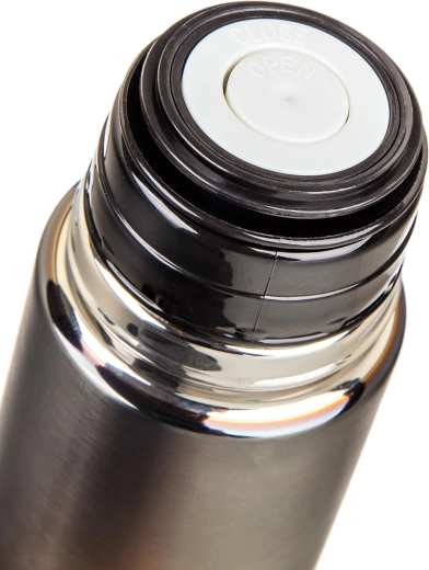 Push-button stopper for convenient pouring