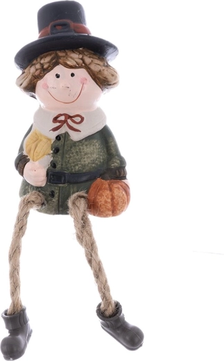 Ceramic boy figurine with fabric legs