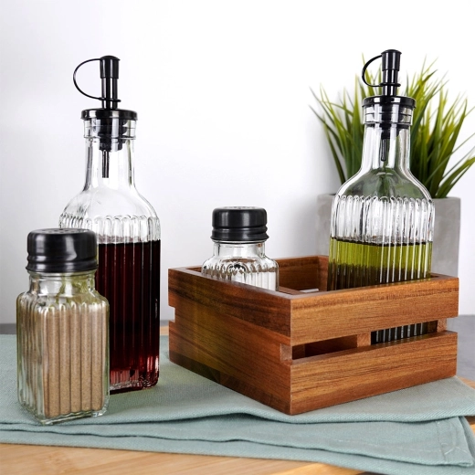 Salt and pepper shakers with controlled dispensing