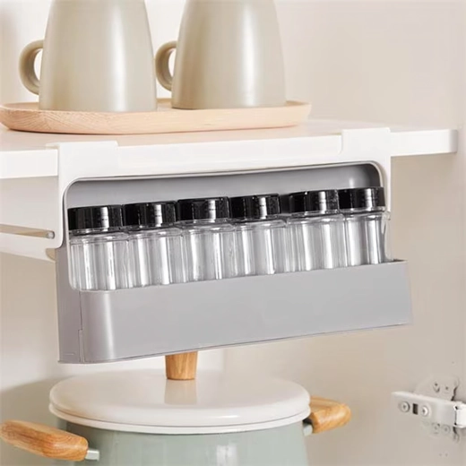 Space-saving under-shelf pull-out design
