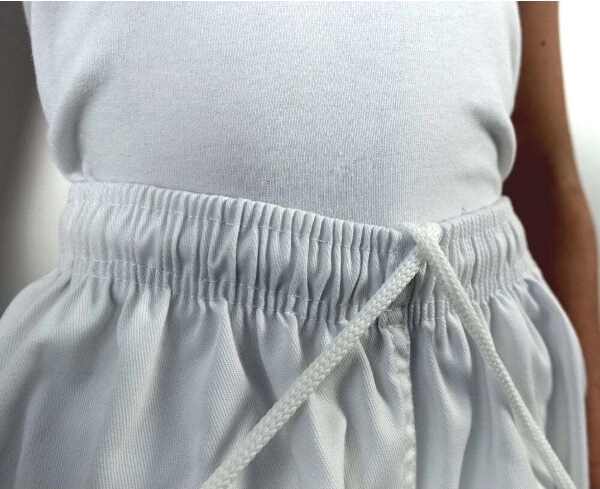 Pants with elastic waistband and reinforcements