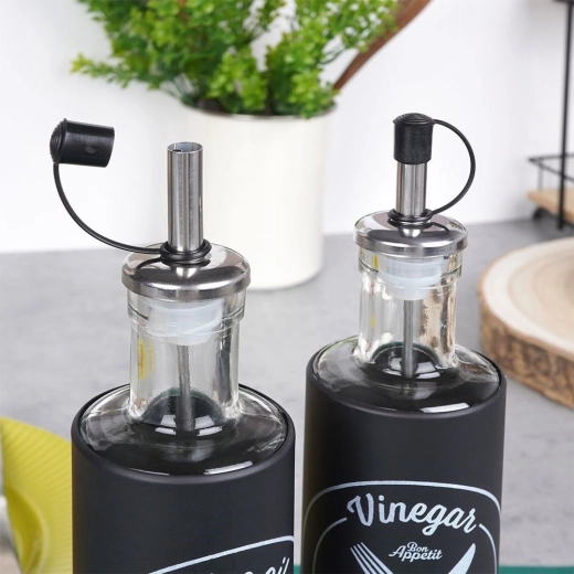 Elegant glass bottles with black sleeve
