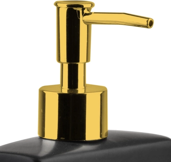 Stilvolle goldene Pumpe