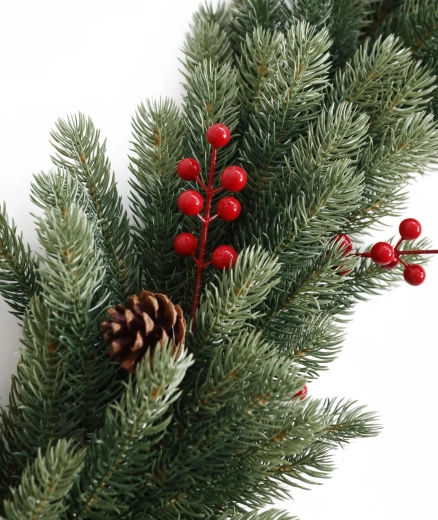 Rich pine needles with cranberries and pine cones