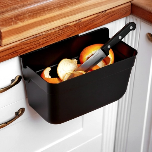 Quickly sweep scraps straight from the countertop