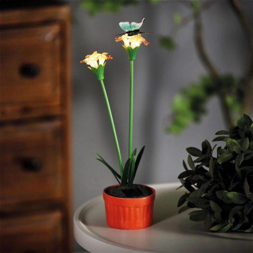 Gekleurde solarbloem met warmwitte ledverlichting, rood