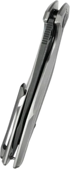 Manche en titane et verrou Frame Lock sécurisé