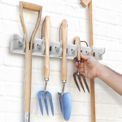 Support mural universel pour outils et accessoires de nettoyage