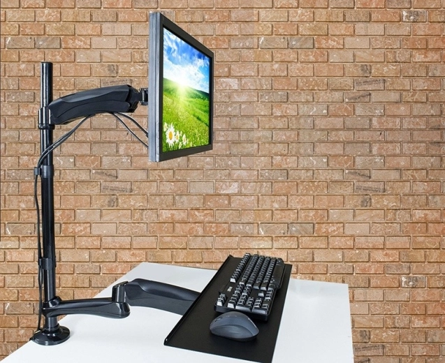 Adjustable arm with space for the keyboard