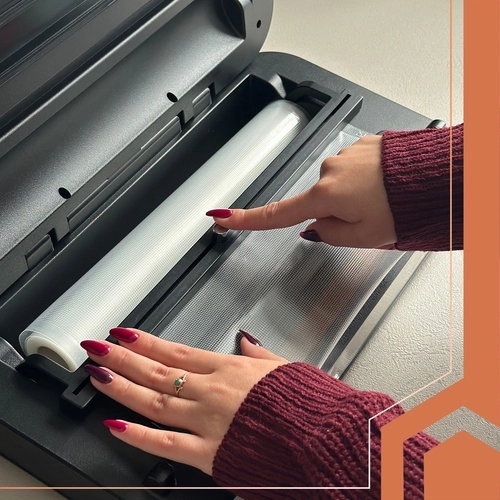 Built-in cutter and roll holder