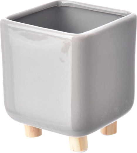 Pot de fleurs gris avec pieds en bois