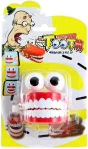Wind-up gag teeth on card