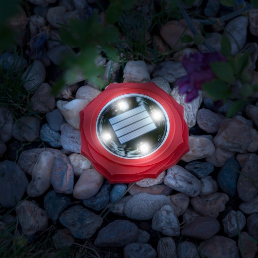 Rode LED-zonnesteeklamp met koud wit licht
