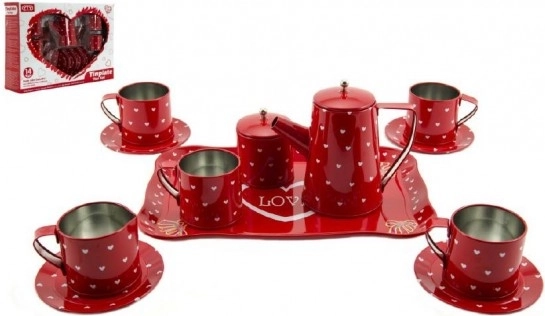 Rood metalen theeservies met hartjes