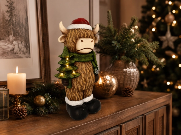 Christmas decorative figurine: mountain cow with LED tree
