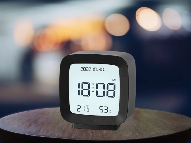 Digital alarm clock with LCD display and temperature and humidity measurement
