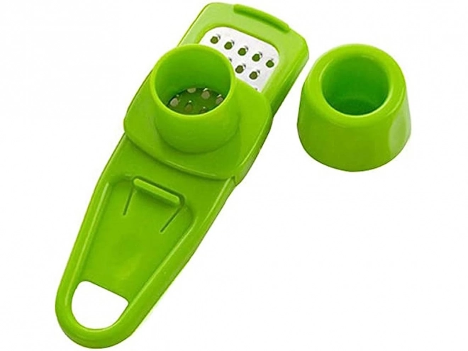 Mini-rasp voor knoflook en gember met veiligheidshouder – groen