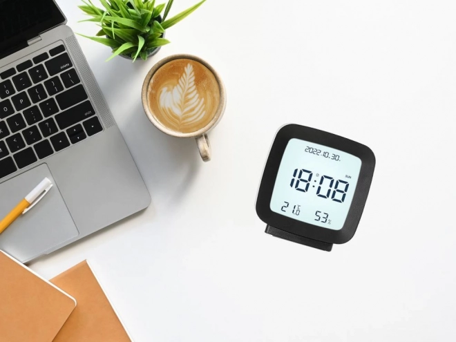 Digital alarm clock with LCD display and temperature and humidity measurement