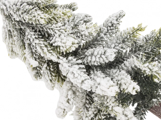 Kleine kunstkerstboom met sneeuweffect