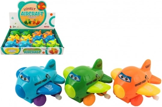 Wind-up airplane with eyes – flapping wings, plastic 8 cm, assorted colors
