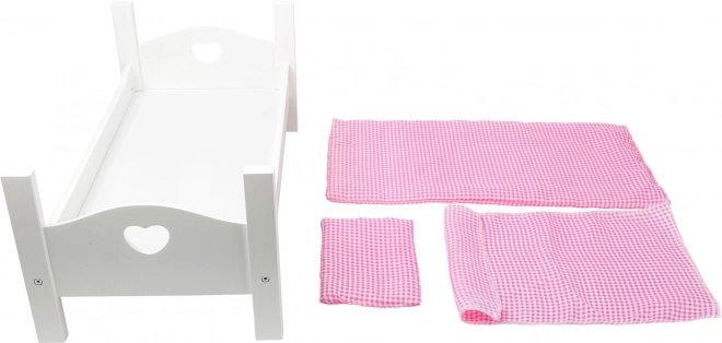 Houten poppenbedje met witte hartjes