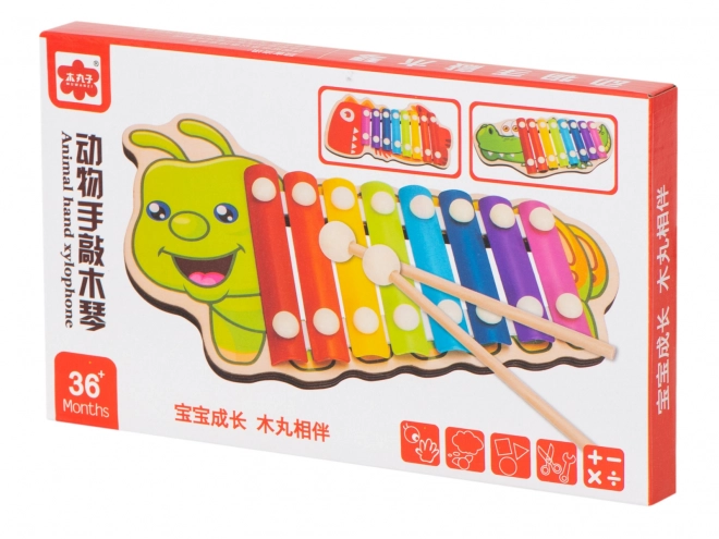 Kleurrijke kinderxylofoon in de vorm van een rups