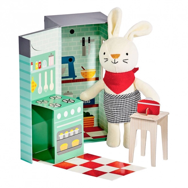 Petit Collage pluchen konijntje in de keuken