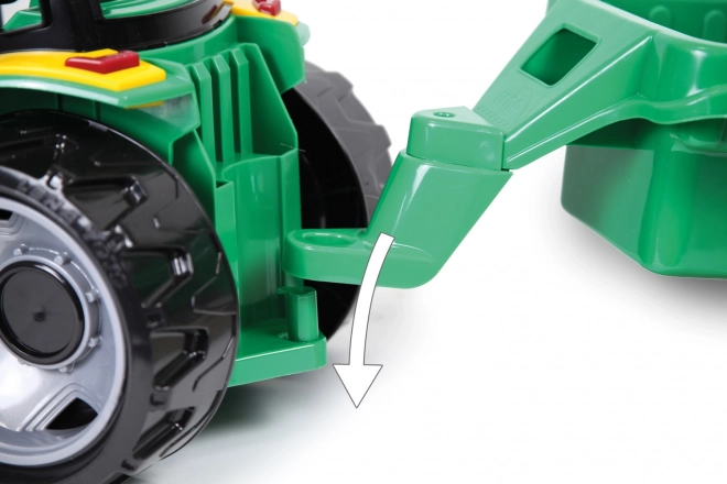 Traktor mit Schaufel und Anhänger