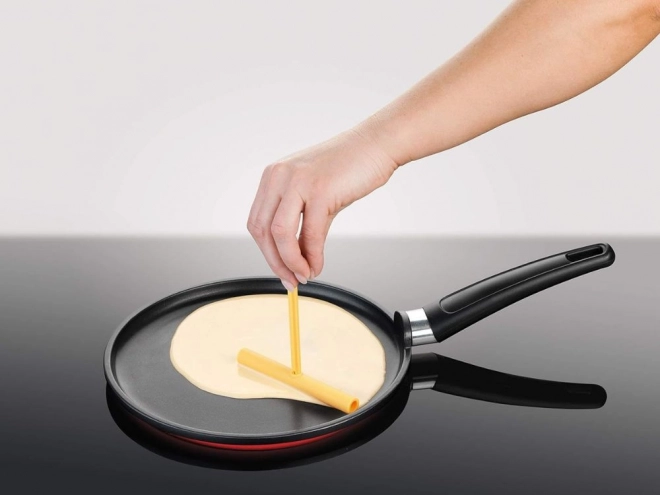 Spatel en roller voor pannenkoeken