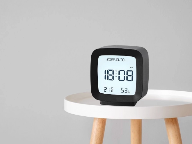Digital alarm clock with LCD display and temperature and humidity measurement