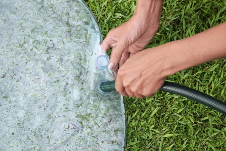 Removable water mat for cooling play