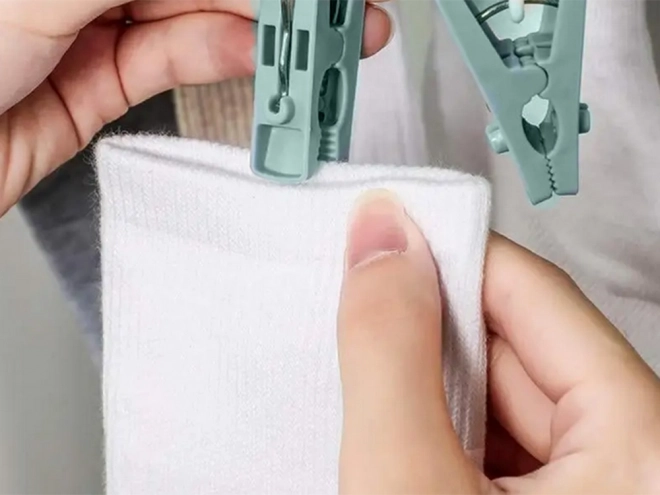 Hanging sock dryer and lingerie rack with 32 clips