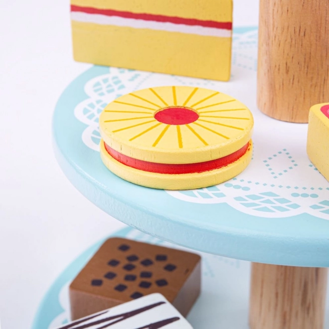 Support en bois avec gâteaux jouets