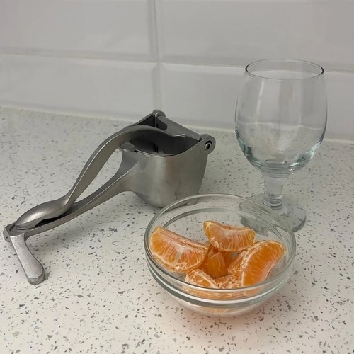 Handmatige citruspers