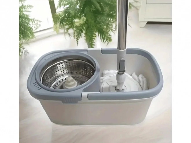 Roterende mop met emmer en microvezel pad