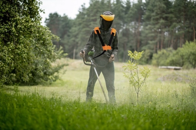 Systeem van riemen voor benzine-grastrimmer
