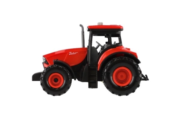 Rode Zetor tractor op traagheidsmotor met licht- en geluidseffecten
