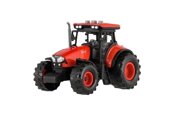Rode Zetor tractor op traagheidsmotor met licht- en geluidseffecten