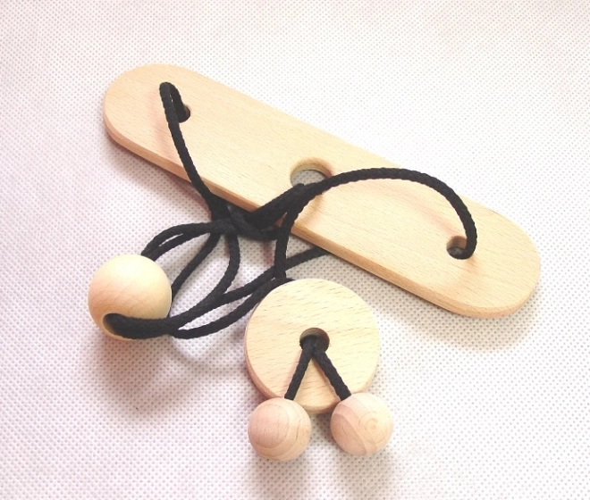 Houten puzzel Knoop op bord