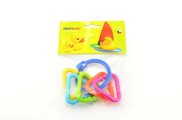 Hochet anneau avec pendentifs multicolores