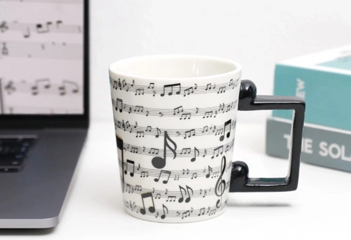 ceramic mug with a musical motif