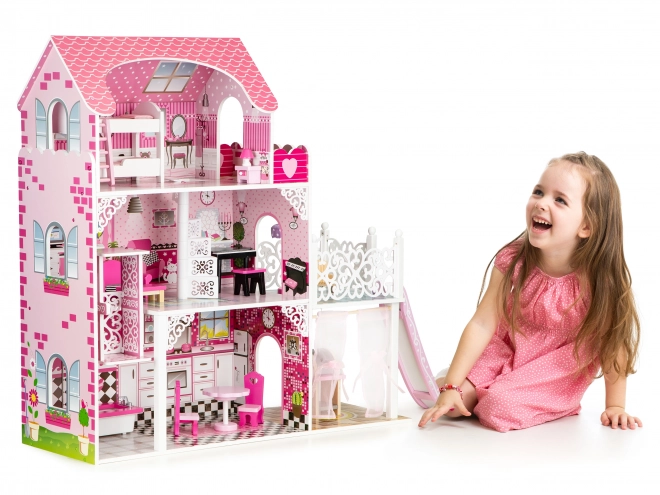 Houten poppenhuis met glijbaan