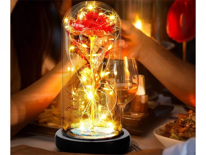 Rose éternelle sous un éclairage en verre